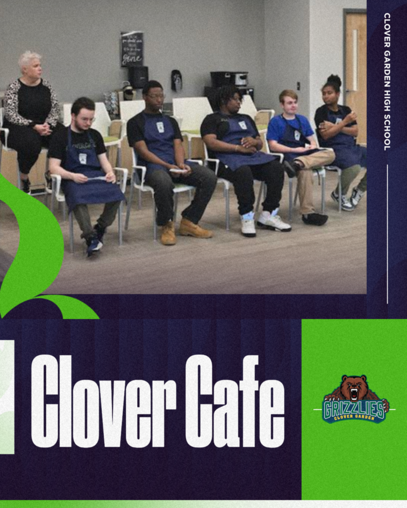Six students wearing blue aprons sit in a row of chairs inside the Clover Café at Clover Garden High School while presenting during a board meeting, with a staff member seated nearby. The Clover Café and Grizzlies logos appear in the graphic design of the slide.