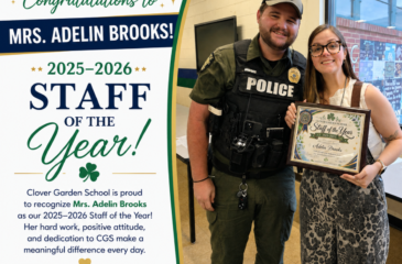Mrs. Adelin Brooks smiles while holding her 2025–2026 CGS Staff of the Year award.