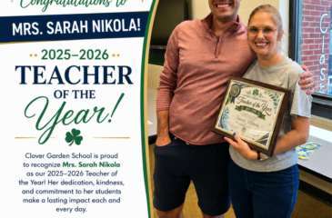 Mrs. Sarah Nikola smiles while holding her 2025–2026 CGS Teacher of the Year award.
