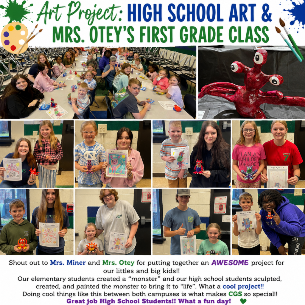First grade students and high school art students pose with colorful monster drawings and matching handmade monster sculptures.