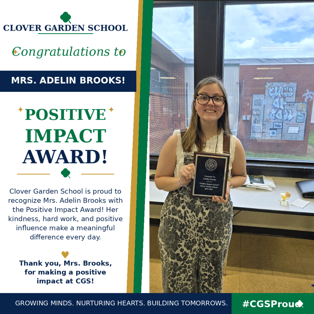 Mrs. Adelin Brooks smiles while holding her CGS Positive Impact Award.