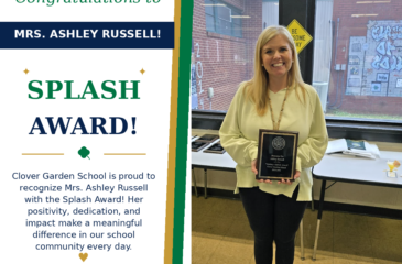 Mrs. Ashley Russell smiles while holding her CGS Splash Award.