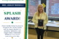 Mrs. Ashley Russell smiles while holding her CGS Splash Award.