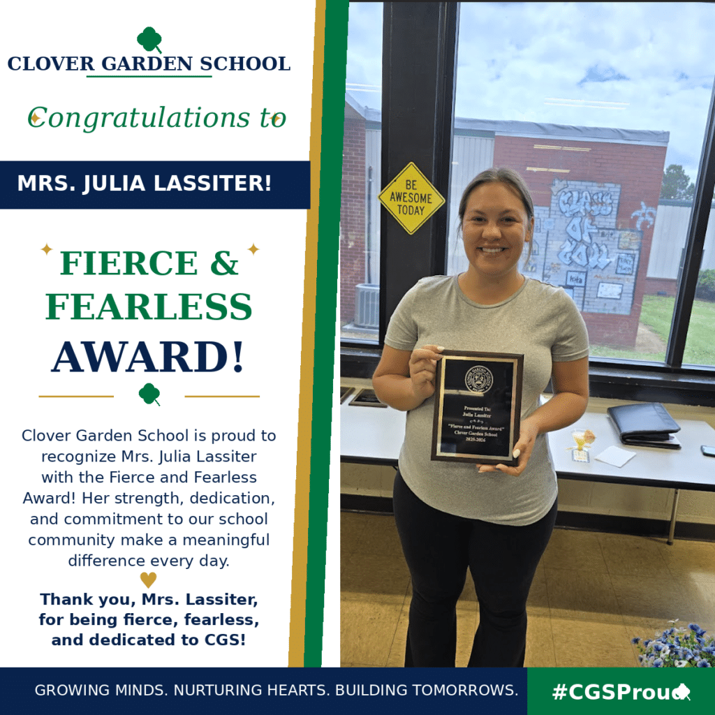 Mrs. Julia Lassiter smiles while holding her CGS Fierce and Fearless Award.
