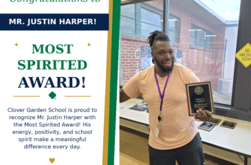 Mr. Justin Harper smiles while holding his CGS Most Spirited Award.