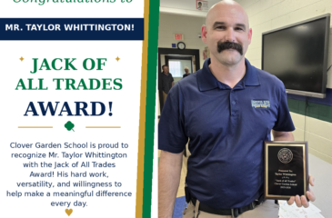Mr. Taylor Whittington smiles while holding his CGS Jack of All Trades Award.