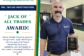 Mr. Taylor Whittington smiles while holding his CGS Jack of All Trades Award.