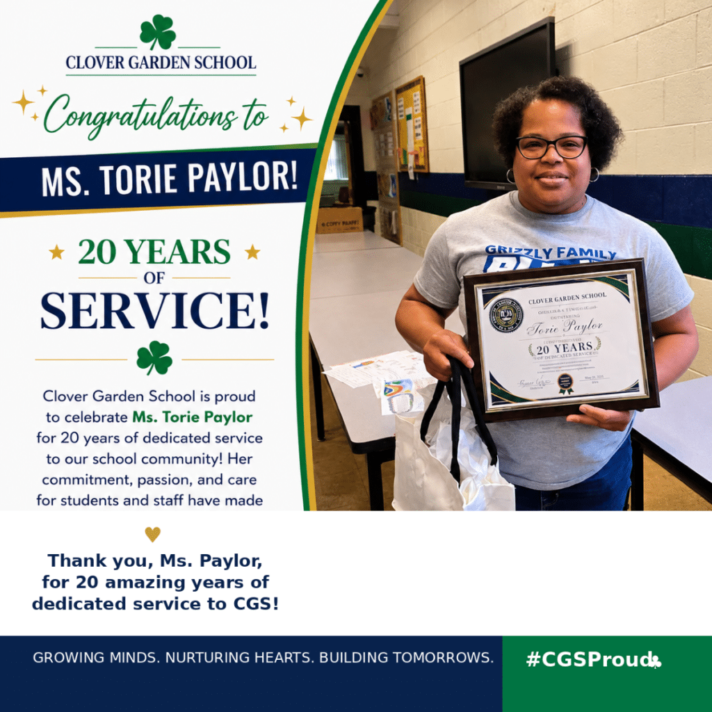 Ms. Torie Paylor smiles while holding her CGS 20 Years of Service recognition award.