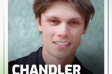 Portrait of a young man in a black suit with the heading “Alumni Spotlight,” labeled Chandler Wyrick of Quality Grading & Clearing, LLC, with Clover Garden School branding and a company logo.