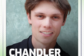 Portrait of a young man in a black suit with the heading “Alumni Spotlight,” labeled Chandler Wyrick of Quality Grading & Clearing, LLC, with Clover Garden School branding and a company logo.